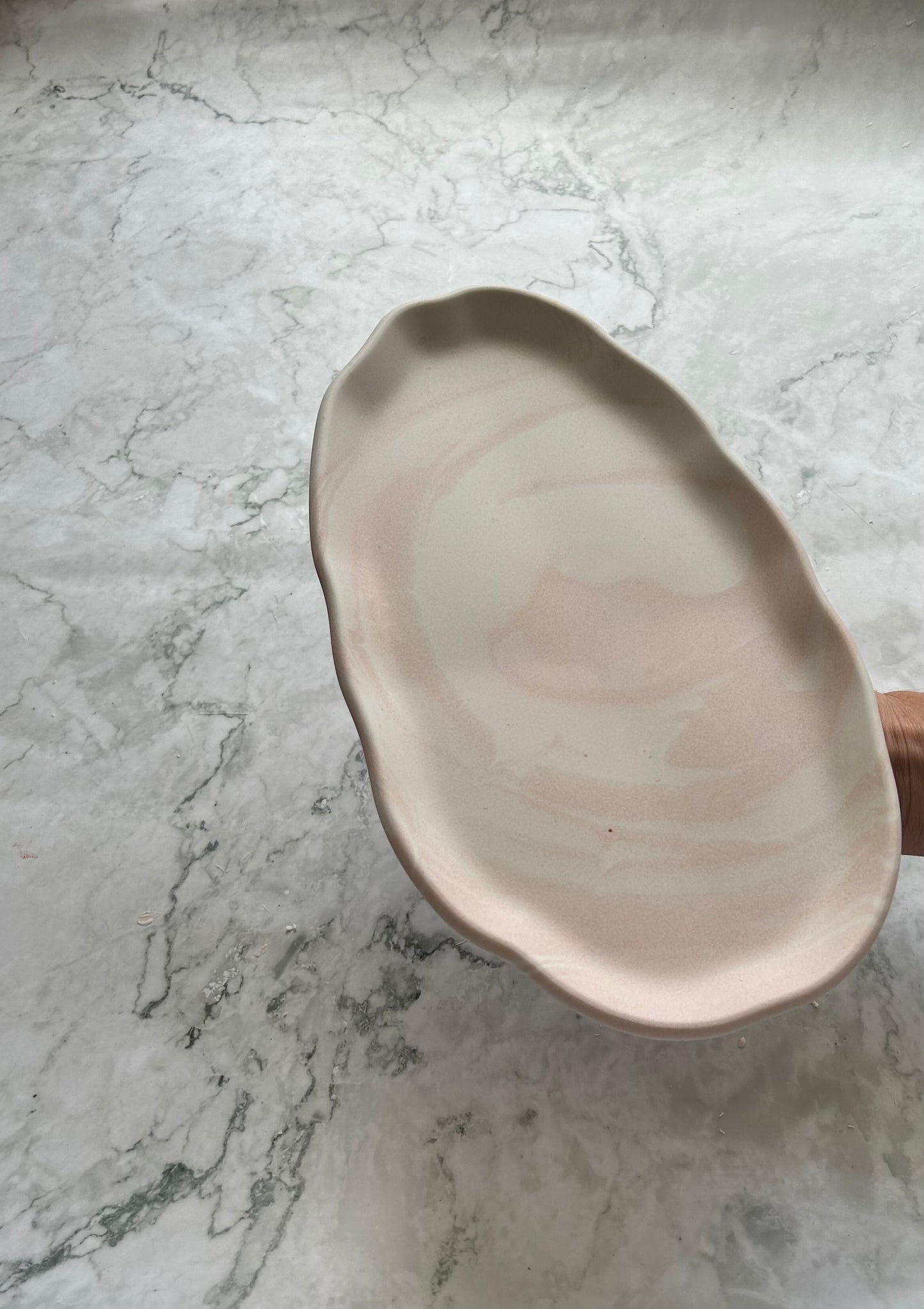 Marble effect in Cream pink hue